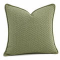 Cuscino decorativo 45 x 45 cm in tessuto verde salvia con bordo intrecciato