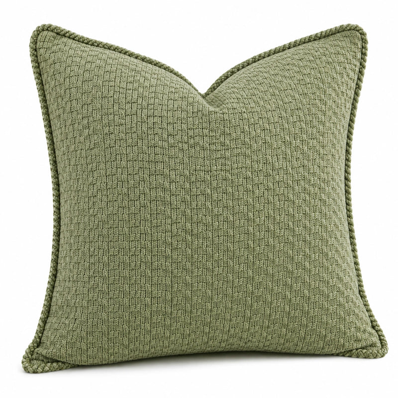 Cuscino decorativo 45 x 45 cm in tessuto verde salvia con bordo intrecciato